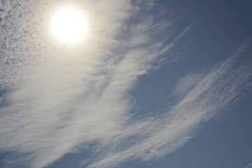 Ravda, Bulgaria. May 28 2014. White cirrus clouds in blue sky in sunlight.