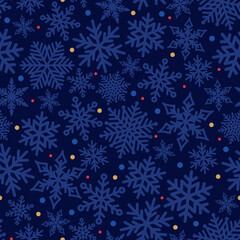 Christmas seamless pattern with snowflakes and confetti. Abstract winter background.  Vector holidays illustration on dark blue background