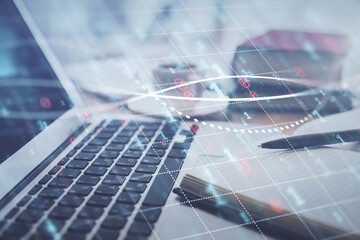 Double exposure of financial chart drawing and desktop with coffee and items on table background. Concept of forex market trading