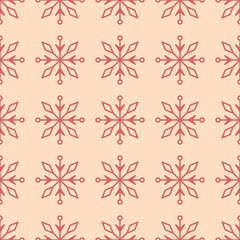 Light yellow seamless pattern with simple red snowflakes for Christmas and New Year design, wrapping paper, wallpapers. 