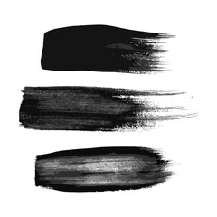 Set of three black hand drawn brush strokes