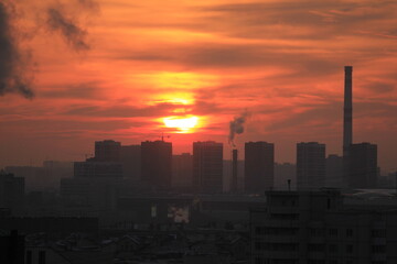 Fototapeta premium Sunrise over the megapolis