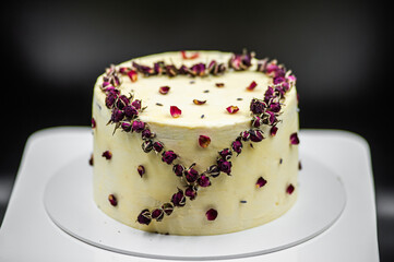 Delicious white vanilla cake with heart decor for Valentine's Day or wedding