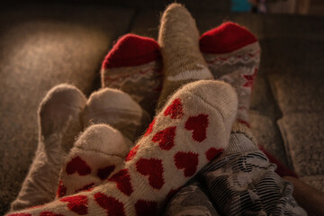 Family. Feet in warm wool socks