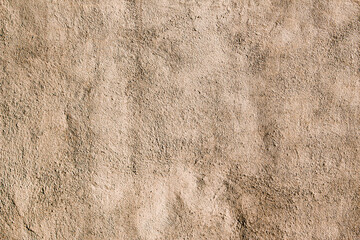 Beige colored abstract wall texture background in different shades of cream or beige