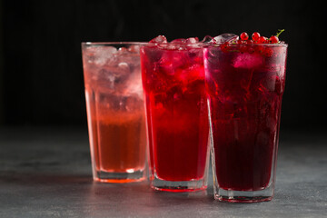 Various summer cocktails on black background