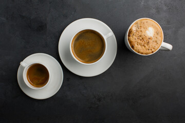 Coffee in restaurant on black background 