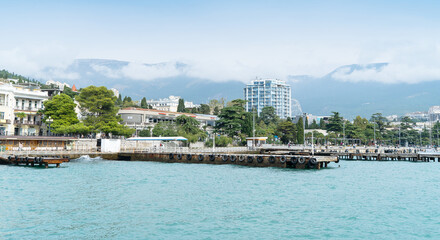 Fototapeta na wymiar YALTA, - October 12, 2020: the city old embankment of the Black Sea Yalta is a popular tourist resort town in Crimea