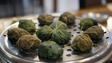 Special dumpling wrapped in steamed leaves