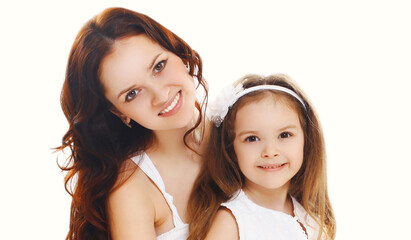 Portrait close up of happy smiling mother with daughter child over a white background