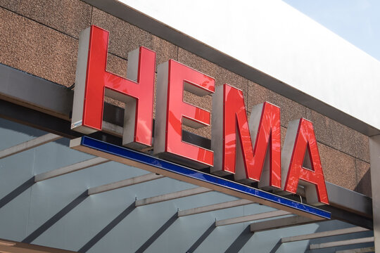 Entrance to Hema store shop showing sign, signage, logo and branding