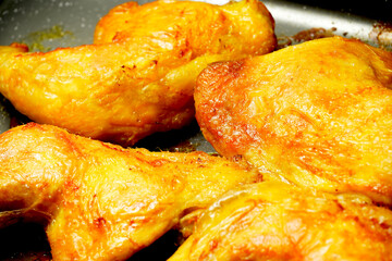 roasted free-range chicken thighs. macro view