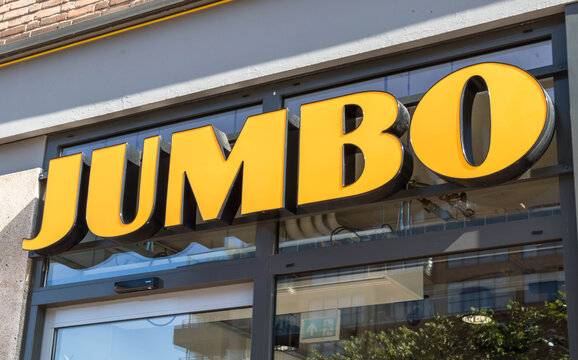 Yellow Jumbo grocery shop sign on outside facade of building