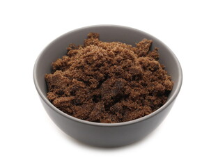 Sugar muscovado in porcelain bowl isolated on white background