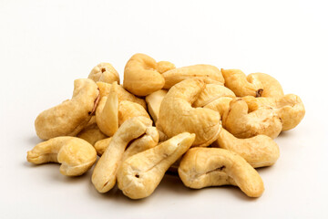 Raw cashew nuts isolated on white background.