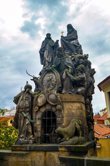 Fototapeta na wymiar Czech, Prague, gothic sculpture of the Cyril and Methodius on the Charles bridge. Prague, medieval art, statue of Saint on the bridge of King Charles.