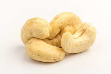 Raw cashew nuts isolated on white background.