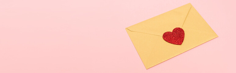 top view of red heart on envelope isolated on pink, banner