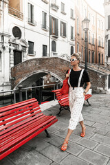 Stylish woman on a street of the Venice city