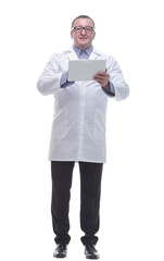 in full growth. a competent mature doctor with a digital tablet.