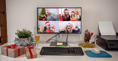 People on video call with family celebrating virtual christmas holidays together online