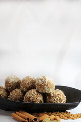  Inidan traditional sweet Fenugreek laddu or methi ke laddu or methi ki pinni made from Fenugreek seeds,jaggery,edible gum,wheat flour and desi ghee.