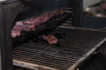Smoking pork ribs in a large oven in a great pub