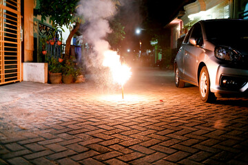 firework at night street scene in frotn of home