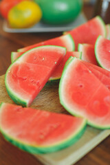 Bright red fresh watermelon slices top view.