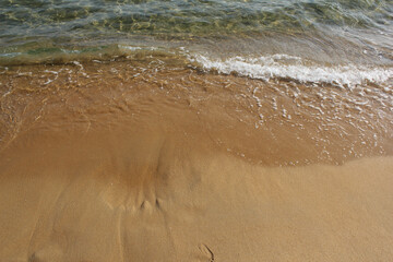 Sand beach and wave