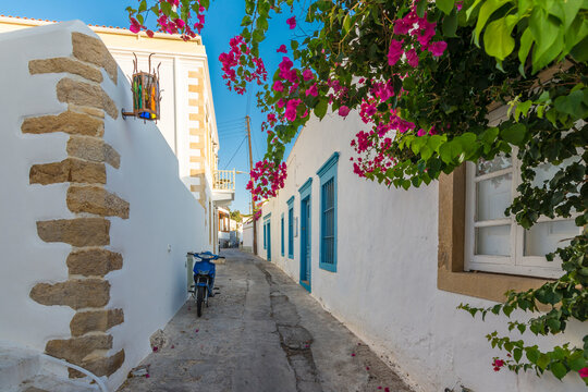 Fototapeta Colorful street of Skala Village in Patmos Island