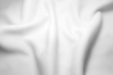 Rippled white cloth background. Fabric texture.