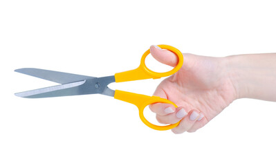 Yellow scissors in hand on white background isolation