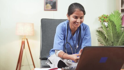 Doctor or nurse busy video chat on laptop from home - concept of Online Chat, telehealth, or tele counseling with patient during coronavirus or covid-19 pandemic.
