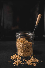 A portion of granola in a glass