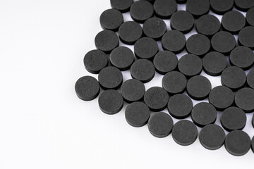activated carbon on a white acrylic background