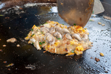 Shellfish fried on a pan thai fast food street food