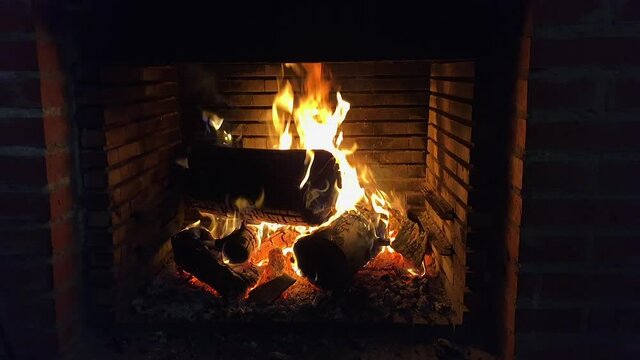 Relaxing view of the fire in the fireplace in slow motion
