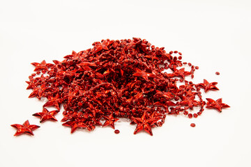 Naklejka premium Red tinsel sparkles with Christmas and new year backgrounds. Christmas decorations