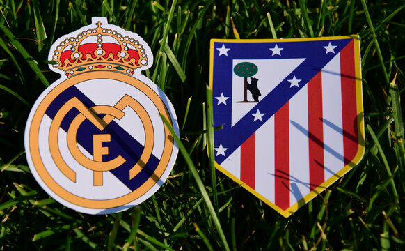 September 6, 2019, Madrid, Spain. Emblems Of Spanish Football Clubs Real Madrid And Atletico Madrid On The Green Grass Of The Lawn.