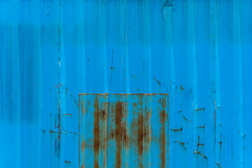 Old Rust Blue Container wall in Cargo container yard close up in Front view