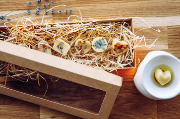 All natural homemade gift, scented mini wax melts with dried flower herbs for decoration in...