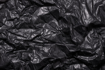 Black Crumpled Paper textured background