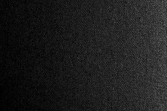 Fabric background in black. Abstract black background with seamless pattern.