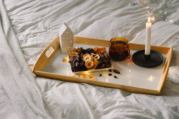 Assorted dried fruits on a tray in a living room. Dietary nutrition. Natural and healthy snack food