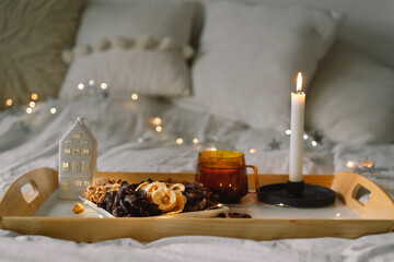 Assorted dried fruits on a tray in a living room. Dietary nutrition. Natural and healthy snack food