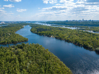 Aerial drone view. Dnieper river in Kiev on a sunny day.