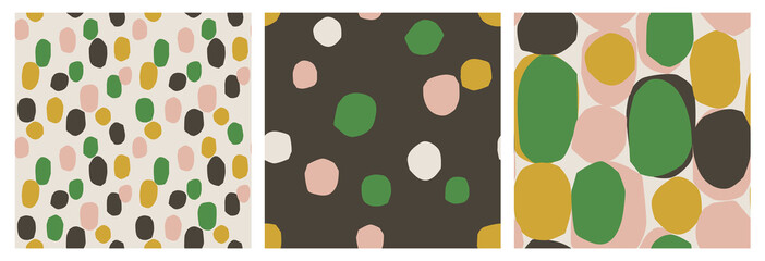 Set of 3 abstract dot seamless patterns with cut out shapes of blobs, ovals, spots. Trendy geometric shapes. Bold prints for fashion, paper, g