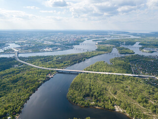 Aerial high view. Unfinished bridge in Kiev, sunny summer day.