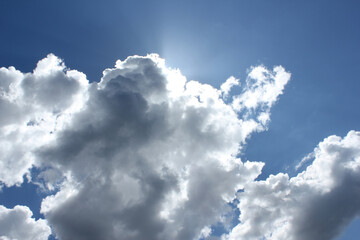 bright cumulus cloud and blue sky